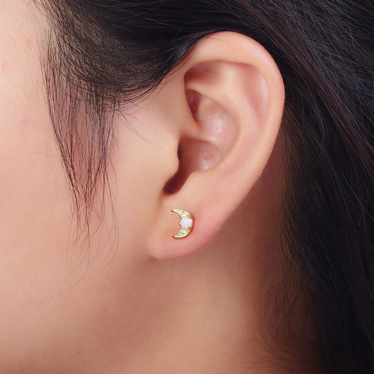 Dainty gold crescent moon stud earrings