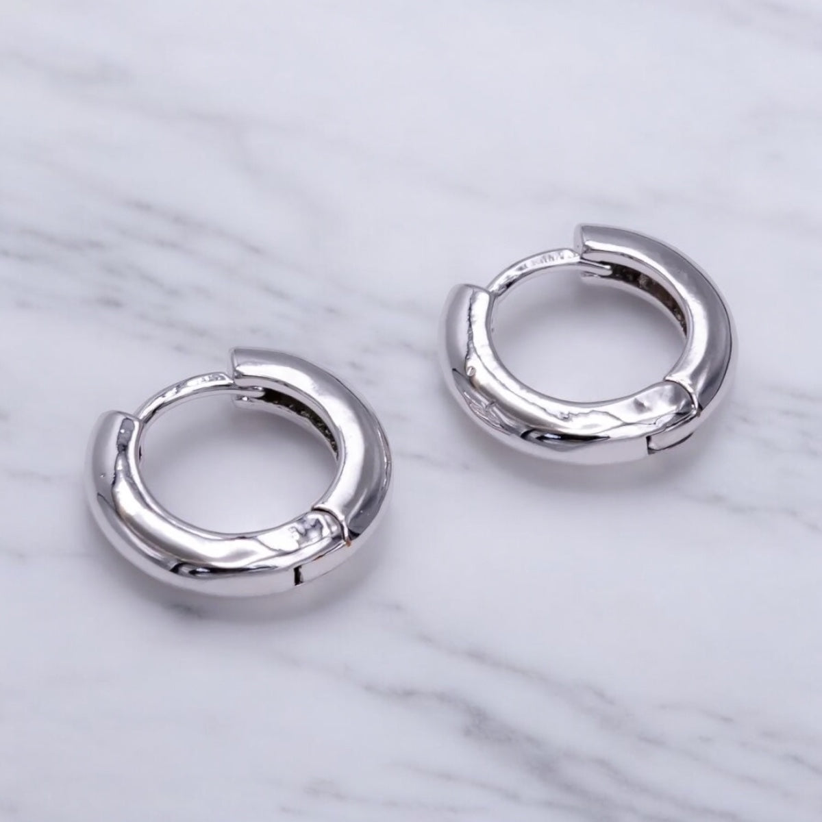 white gold Huggie hoop earrings