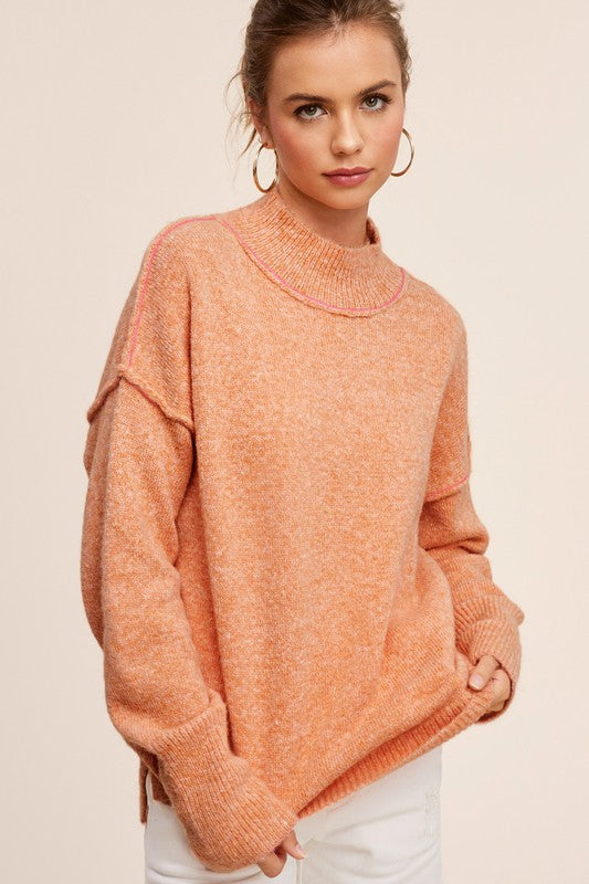 coral high neck textured sweater