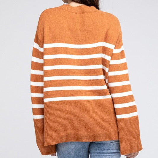 Rust sweater with white stripes and side slit